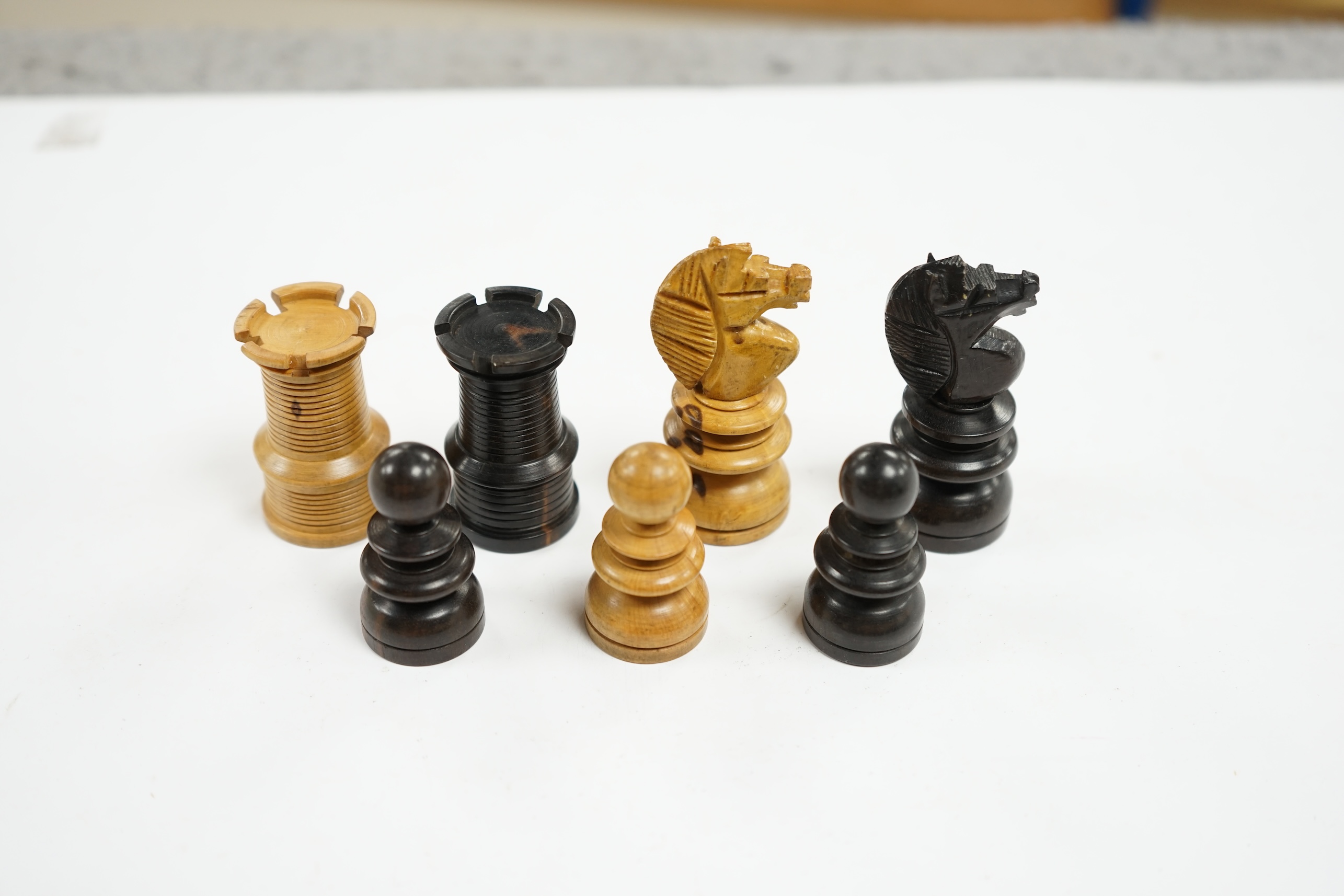 A Staunton turned wood chess set. Condition - good